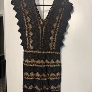 Black lace romper with nude lining NWT